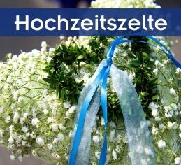 Exklusives Hochzeitszelt mieten Zeltverleih Erding Gestecktes Herz aus grün-weißen Blumen